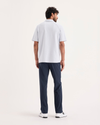 Back view of model wearing Navy Blazer Go Chino, Slim Fit with Airweave.
