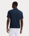 Back view of model wearing Navy Blazer Go Polo, Regular Fit.