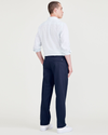 Back view of model wearing Navy Blazer Signature Iron Free Khakis, Pleated, Classic Fit with Stain Defender®.