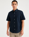 Front view of model wearing Navy Blazer Signature Stain Defender Shirt, Classic Fit.