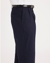 Side view of model wearing Navy Signature Khakis, Pleated, Classic Fit (Big and Tall).