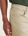 View of model wearing New British Khaki Jean Cut Pants, Athletic Fit.