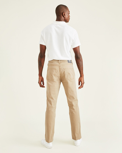 Back view of model wearing New British Khaki Jean Cut Pants, Straight Fit.