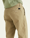 View of model wearing New British Khaki Original Chinos, Straight Fit.