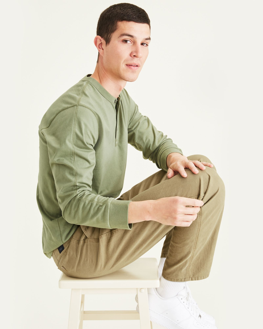 View of model wearing New British Khaki Original Chinos, Straight Fit.