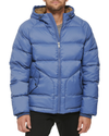 Front view of model wearing Ocean Blue Recycled Nylon Puffer Parka.
