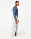 View of model wearing Porcelain Khaki Comfort Khakis, Pleated, Relaxed Fit.