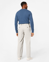 View of model wearing Porcelain Khaki Comfort Khakis, Pleated, Relaxed Fit.