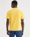 Back view of model wearing Primrose Yellow Rib Collar Polo, Slim Fit.