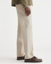 Side view of model wearing Sahara Khaki Essential Chinos, Classic Fit.