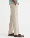 Side view of model wearing Sahara Khaki Essential Chinos, Straight Fit.