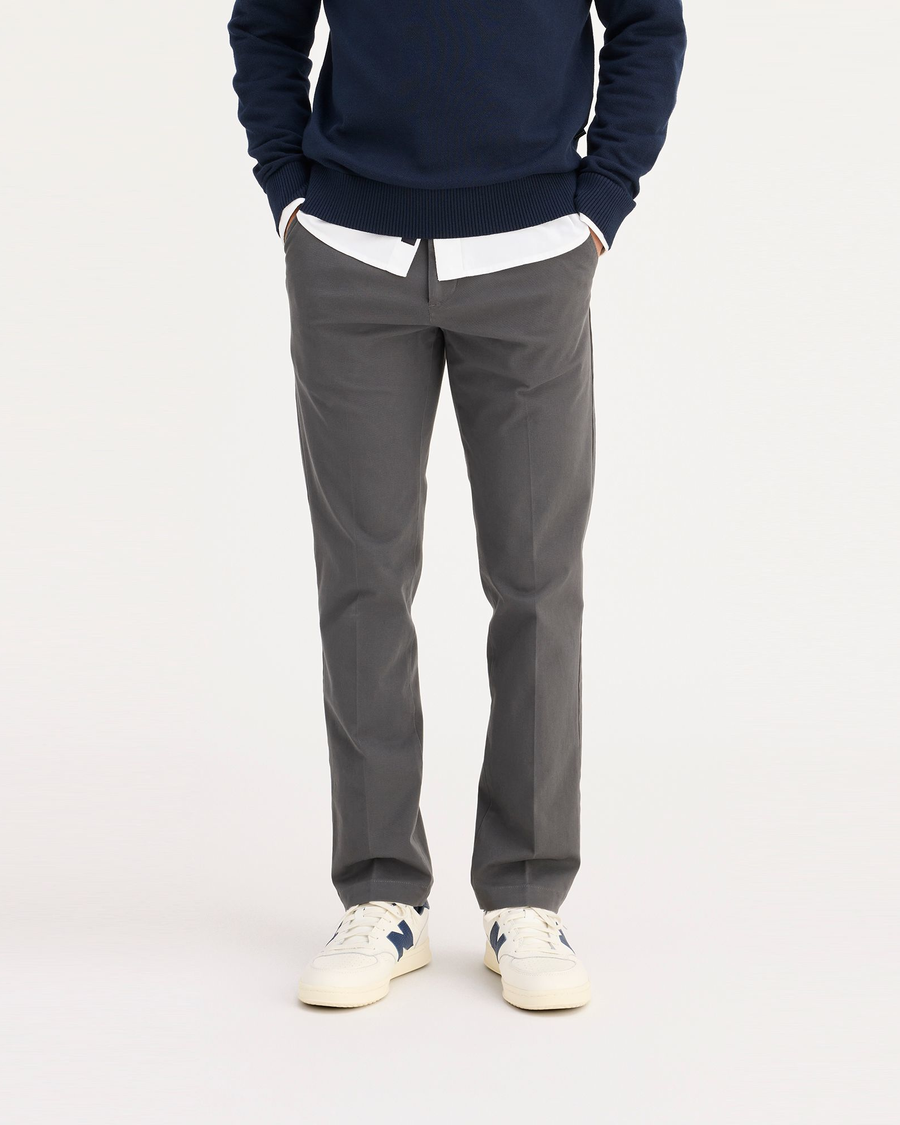 Front view of model wearing Storm Workday Khakis, Slim Fit.