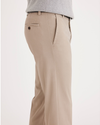 Side view of model wearing Timber Wolf Easy Khakis, Slim Fit.