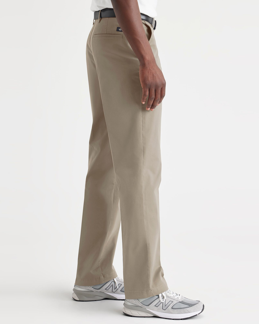 Side view of model wearing Timber Wolf Essential Chinos, Classic Fit.