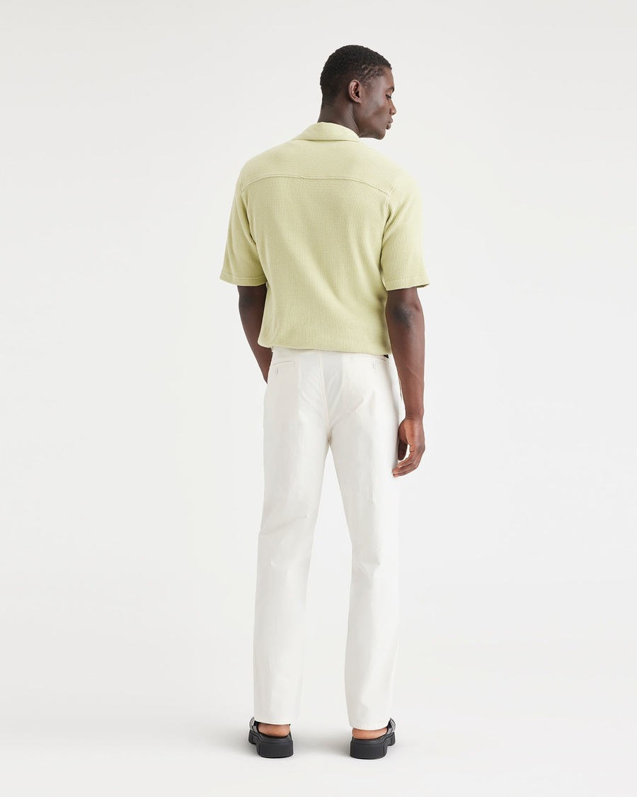 Back view of model wearing Undyed Cottom Hemp Original Chinos, Relaxed Tapered Fit.