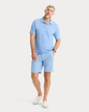 View of model wearing Vista Blue Rib Collar Polo, Slim Fit.