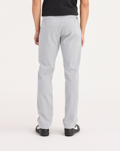 Back view of model wearing Wet Stone Ultimate Chinos, Slim Fit.